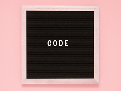 Black board with the word code