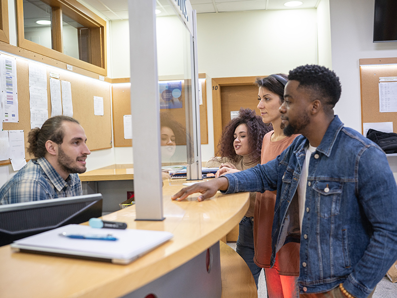 Students Talking to Administrator