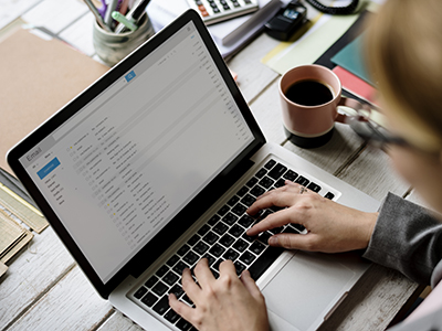 Person typing on a computer